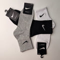 Calceta 2/4 Nike con logo bordado