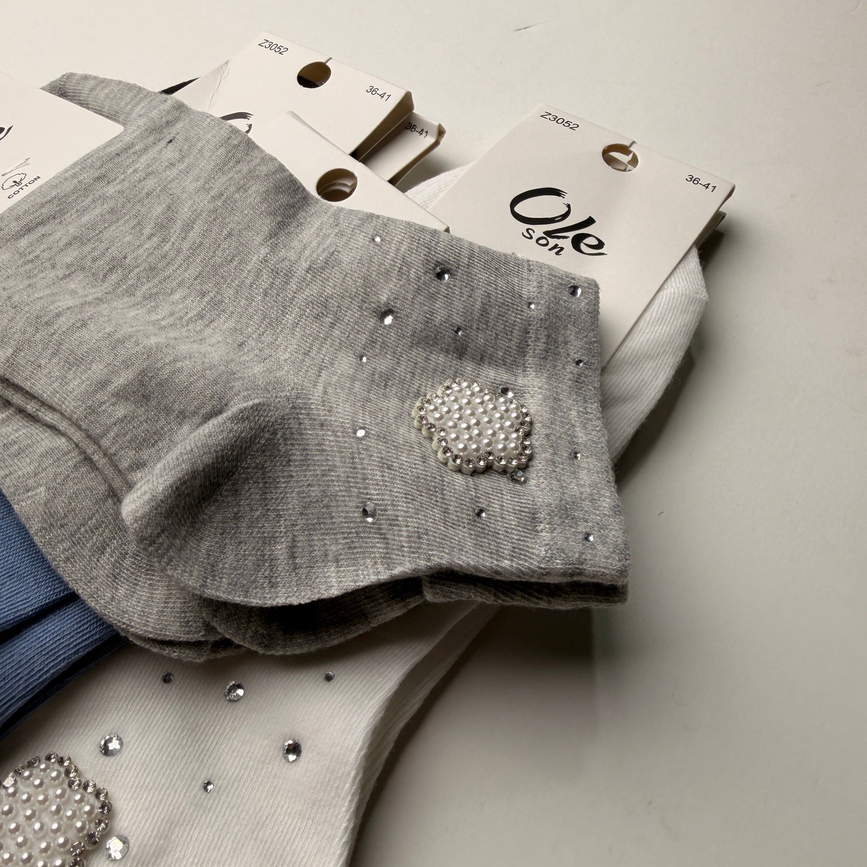 Tin con aplicación Ole son